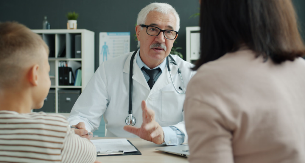 Patient discussing the cost of a doctor visit with a physician